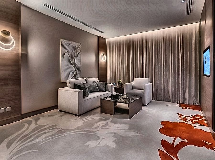 Suite lounge with a patterned wool carpet